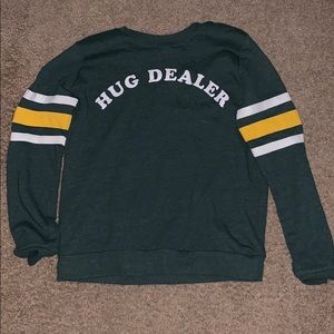 Green mighty fine hug dealer sweater